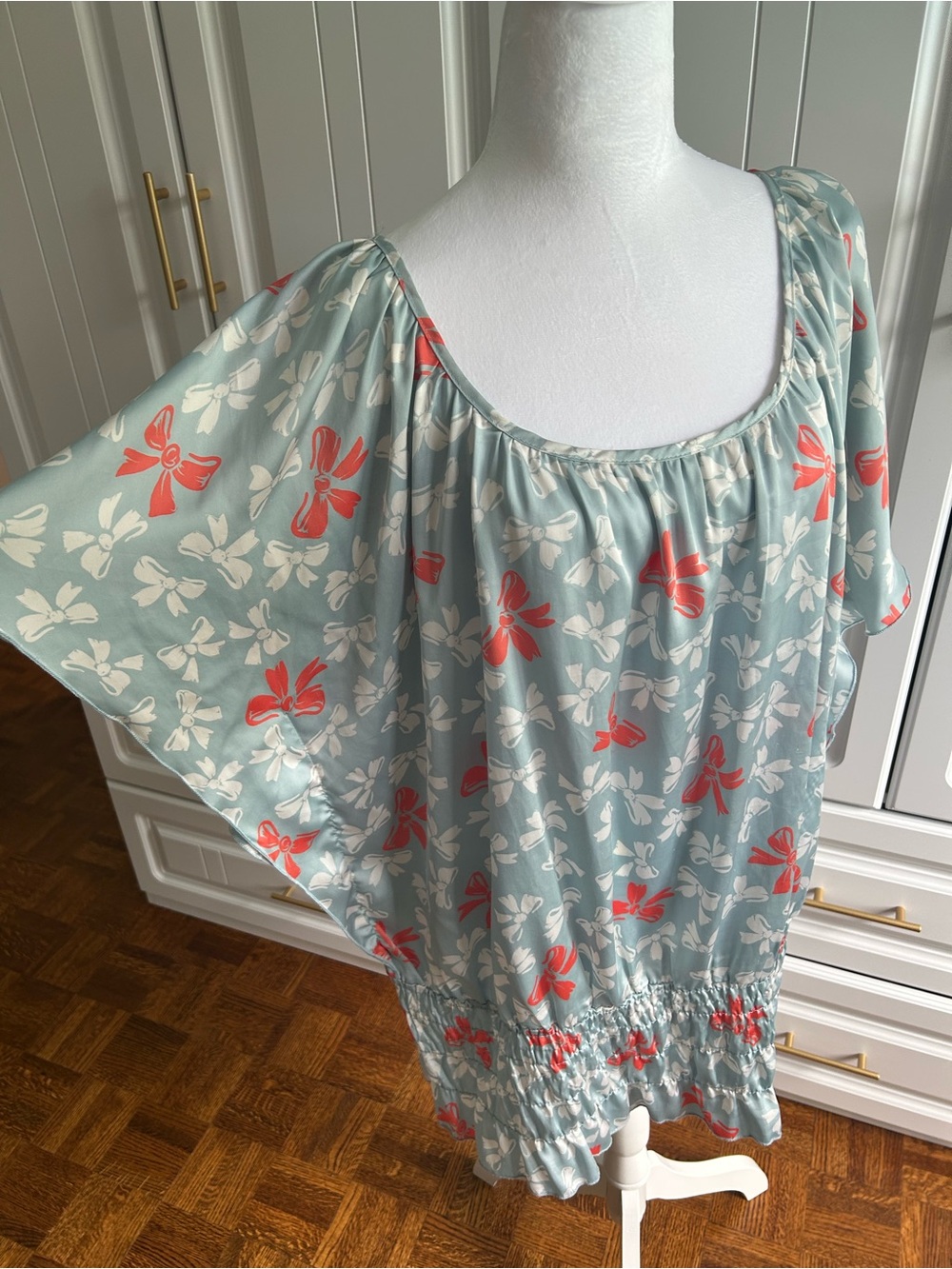 Light Blue Floral Flutter-Sleeve Blouse with Coral Accents